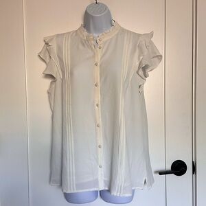 Sleeveless blouse high neck with cute details